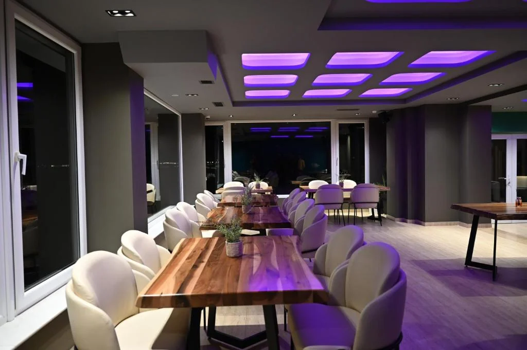 Restaurant with warm ceiling lighting