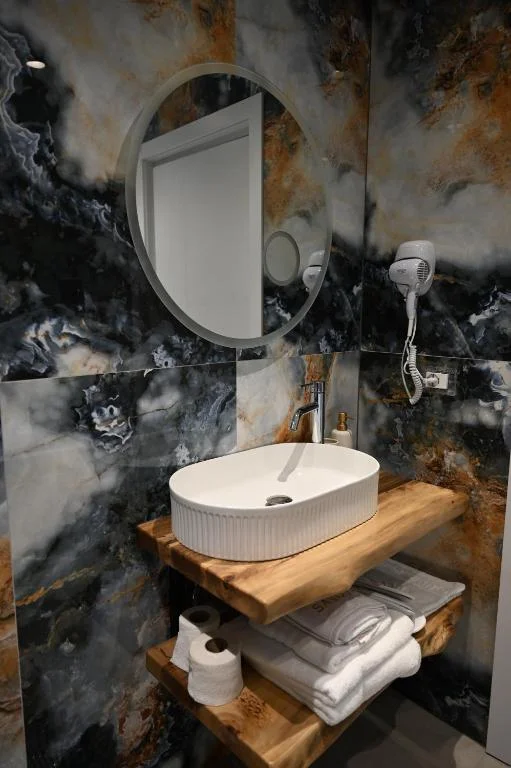 Two-Bedroom Apartment marble bathroom detail